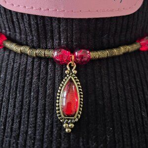 Cowgirl Style Red Glass Bead Hat Band with Antique Gold Pendant